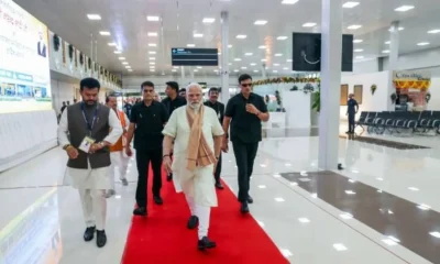 Modi walk with black cats