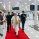 Modi walk with black cats