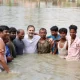 Rahul jumps into muddy pond